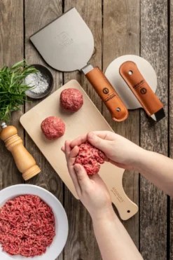 Hampurilaispihvipuristin grillilastalla, Neopreenikädensijalla